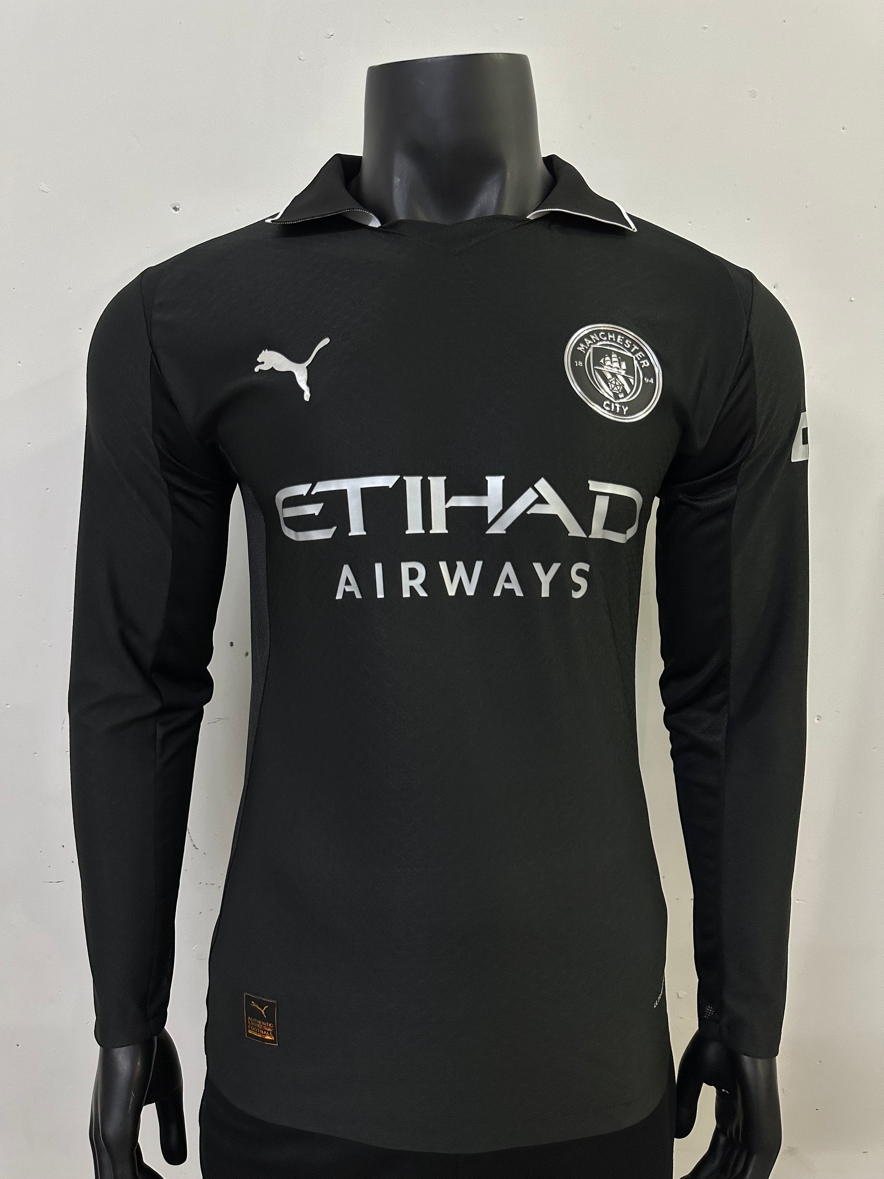 camiseta city negra manga larga